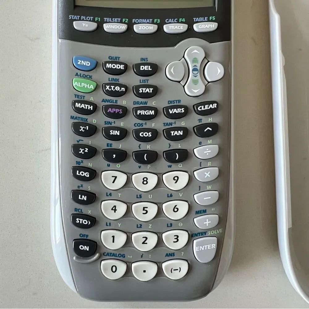 Texas Instruments TI-84 Plus Silver Edition Graphing Calculator with cover
